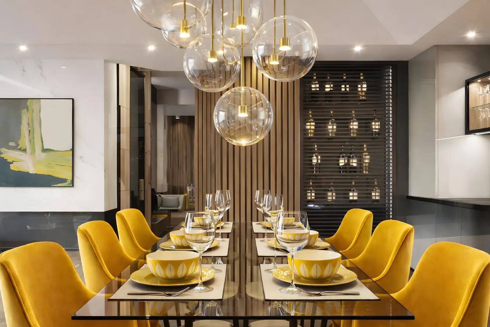 Luxury dining room interior design with statement lighting and custom modern finishes in south Florida.