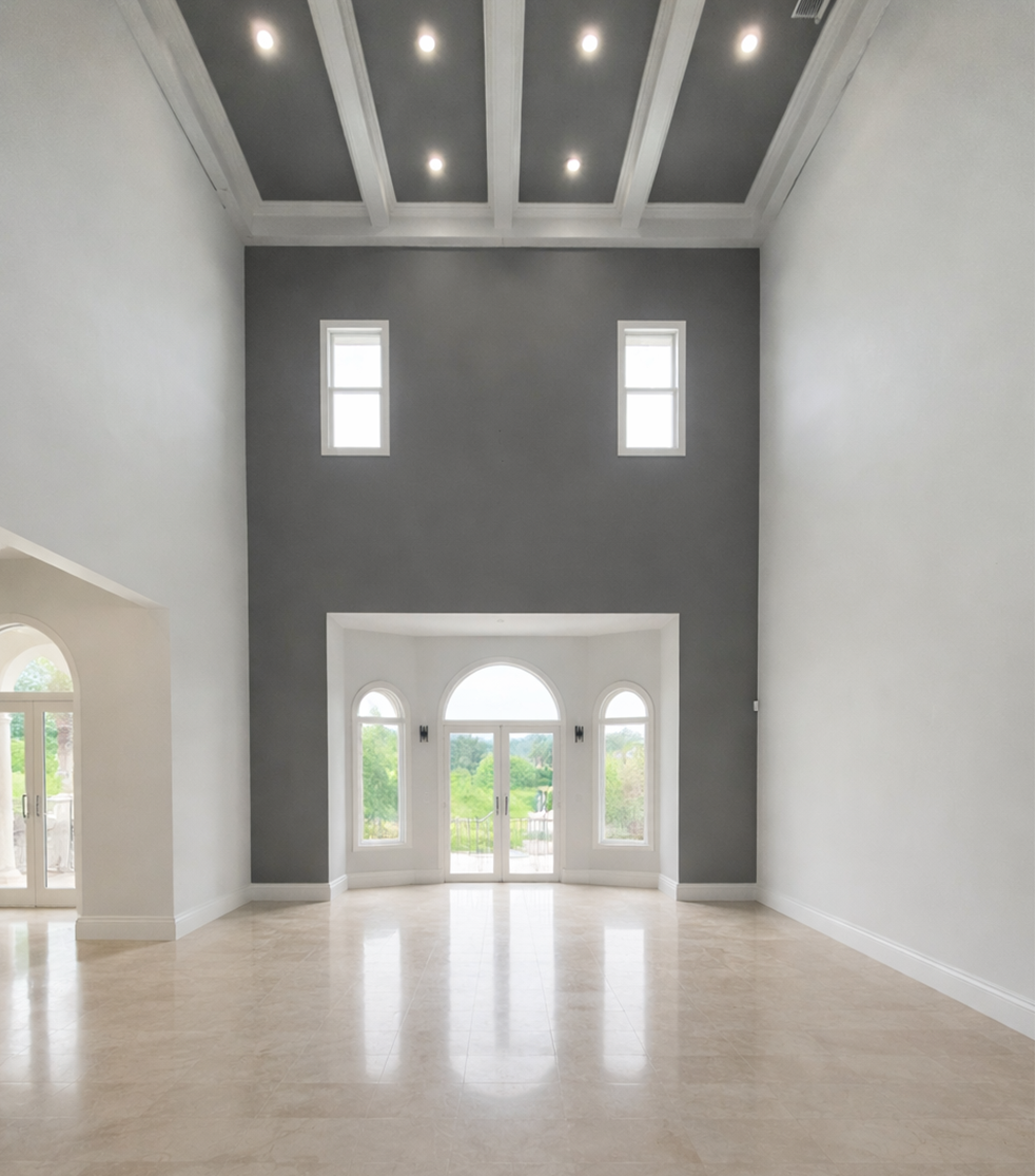 Spacious empty modern living room with high ceiling